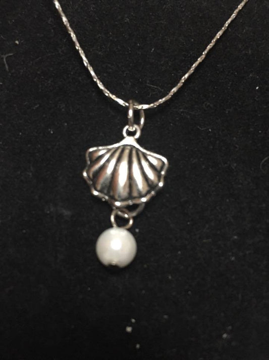 Shell charm